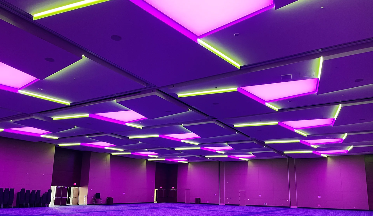 Custom multi-color architectural ceiling lighting installation inside the grand ballroom at the Irving Convention Center.
